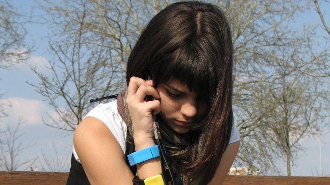 Young woman demeaning herself